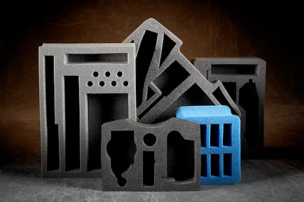 Open aluminum case with rifle